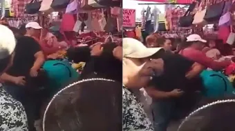 Comerciantes rapan a dos mujeres acusadas de robo en el mercado de Izúcar; VIDEO desata indignación