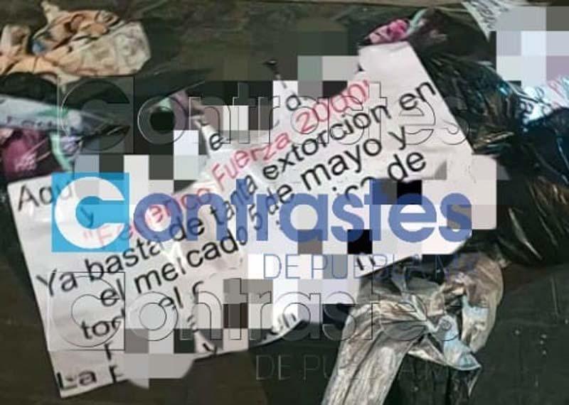 Dos cuerpos con cartulina amenazante para “El Fede” aparecen en el Centro Histórico de Puebla