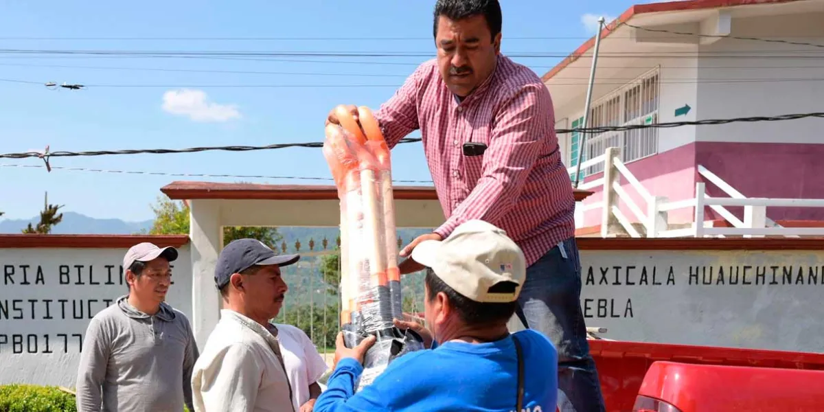 En Huauchinango distribuyen más herramientas para reabrir caminos   