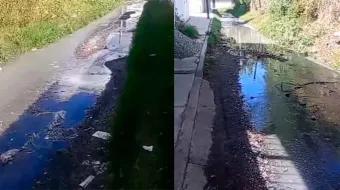 Fuga de drenaje preocupa a vecinos de Hueyatzacoalco; autoridades siguen sin atender el problema